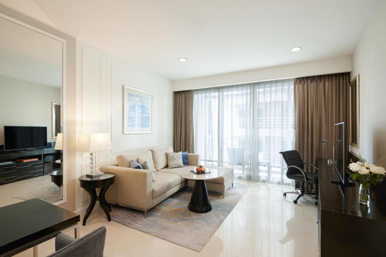 Dusit Suites Hotel Ratchadamri, Бангкок Екстер'єр фото A living room in a serviced apartment in Singapore
